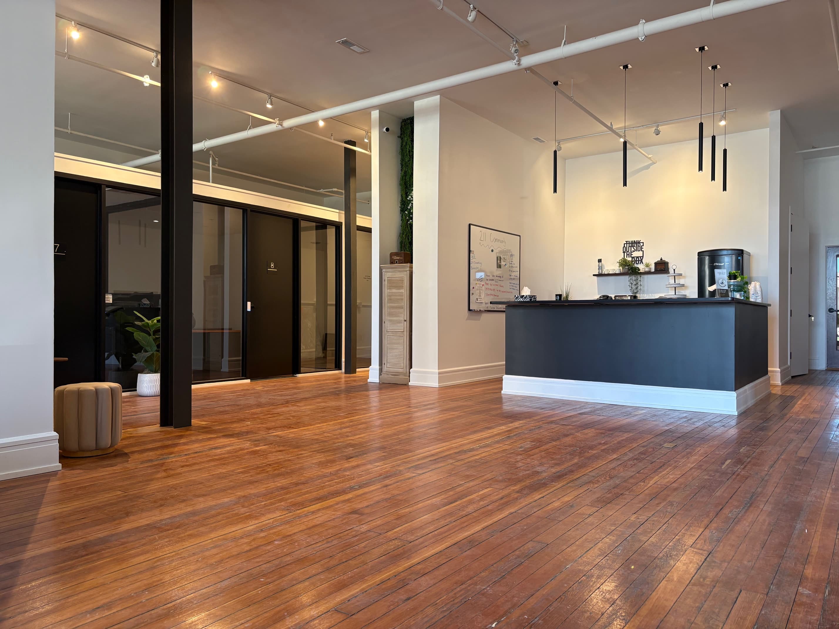 Open space with coffee bar and pendant lighting