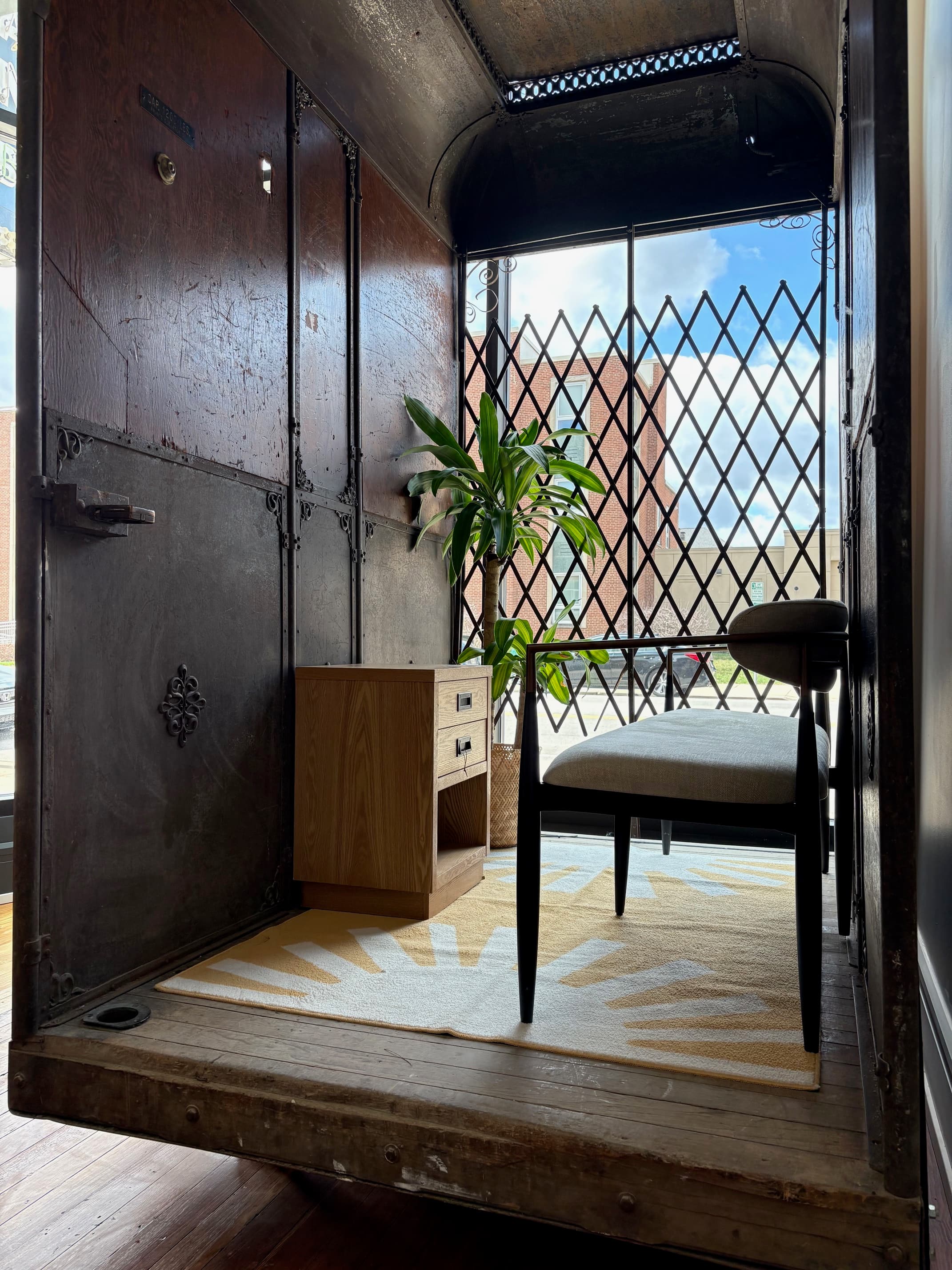 Work desk near window with plant and natural light