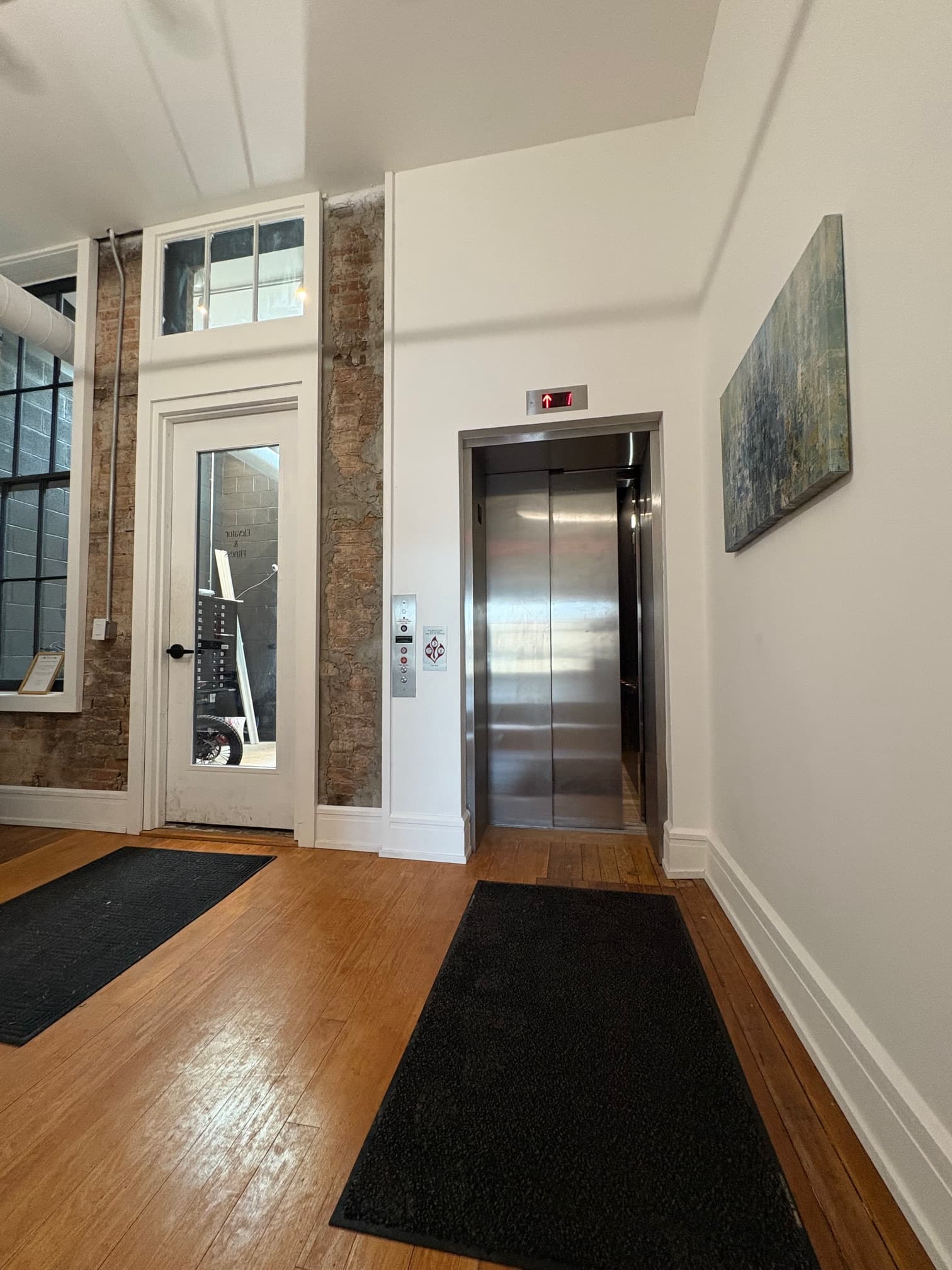 Office area with fireplace and wood accents